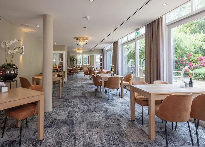 Ξενοδοχείο Fletcher Restaurant De Witte Raaf 4*